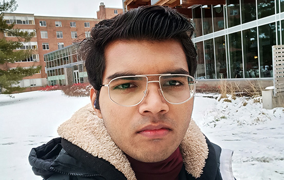 Sadwal Patel standing on MSU campus in winter